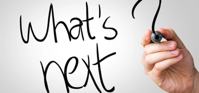_whats-next-hand-writing-with-a-marker-on-transparent-board