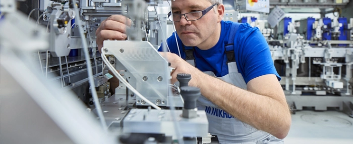 man-working-on-machine