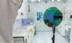 engineer-looking-at-wafer