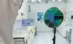 engineer-looking-at-wafer