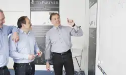 Men-by-whiteboard